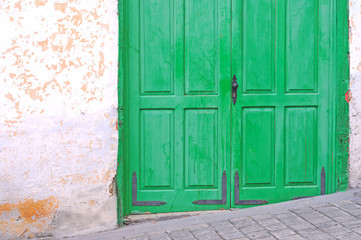 Green painted vintage wooden door