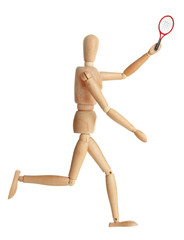 Wooden mannequin with tennis racket on grey background