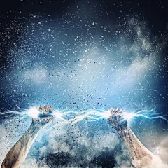 Acrylic prints Storm Human hand holding lightning