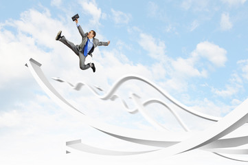 Businessman jumping