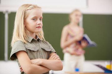 Little girl at school class