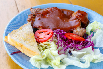 grilled pork steak with bread
