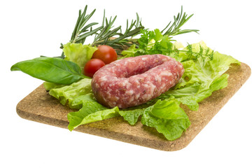 Salami with rosemary, salad and tomatoes