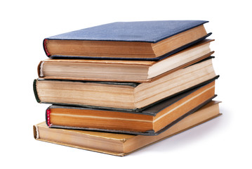 stack of books to read in hard covers on a white background