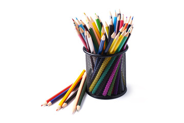 Fototapeta premium colored pencils in basket on white background