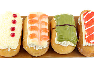 Donuts sort in the  bamboo dish.