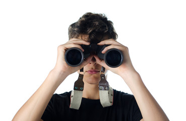 teen boy looking through binocular