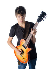 teenager boy standing and playing guitar serious