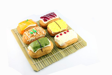 Mix color Sushi Donuts in bamboo dish.