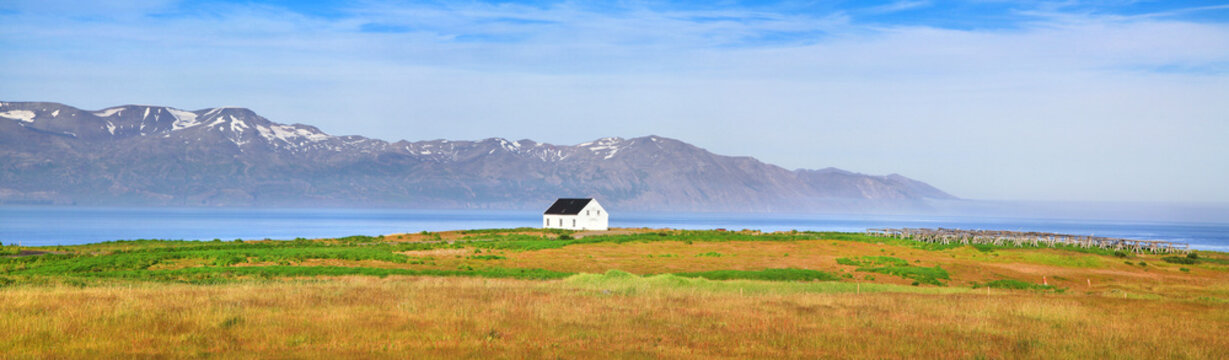Panoramic view of beautiful landscape with old house in Iceland © JFL Photography