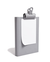 White Paper Clipped to Grey Book