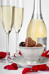 Rose petals, champagne and chocolates