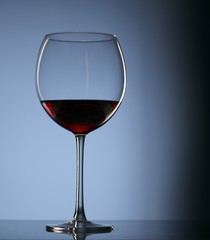 Elegant photo of a glass of red wine