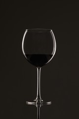 Elegant photo of a glass of red wine