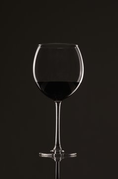 Elegant photo of a glass of red wine