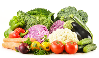 Variety of fresh organic vegetables isolated on white