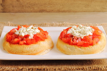 Dakos, Cretan recipe with bread, tomato, feta and oregano