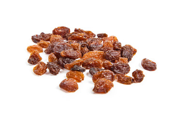 brown raisins on a white background