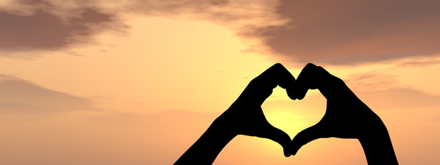 Conceptual heart shape sunset silhouette