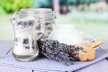 Obraz premium Jar of lavender sugar and fresh lavender flowers