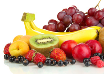 Fresh fruits and berries isolated on white