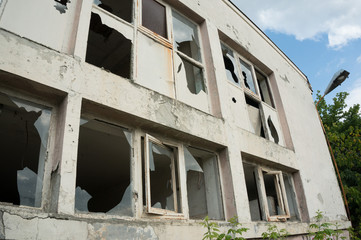abandoned building with broken windows