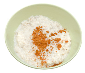 oat porridge with cinnamon in yellow bow