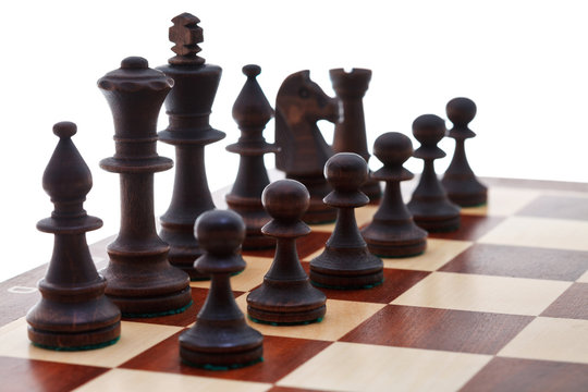 black chess pieces placed on chessboard