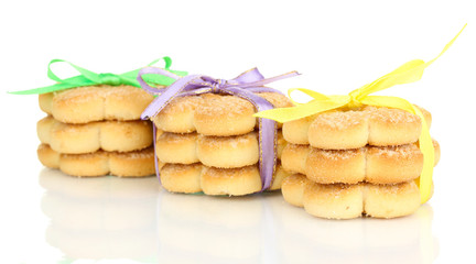 Sweet cookies tied with colorful ribbons isolated on white