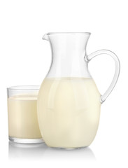 Milk in jug and glass isolated on white