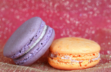 Macaroons on fabric background