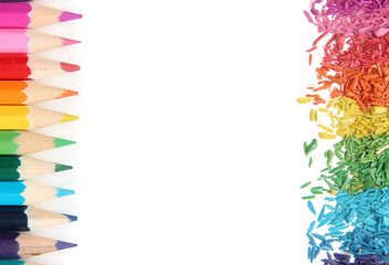 Colour pencils with sharpening shavings isolated on white