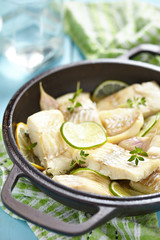 Baked fish fillet with lime and garlic