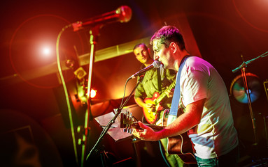 Band performs on stage