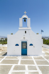 greek chapel isolated on blue sky - obrazy, fototapety, plakaty