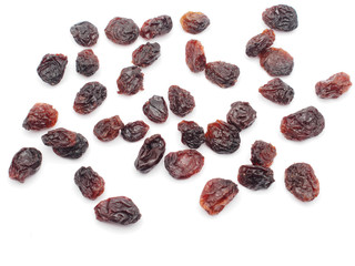 Raisins on the white background