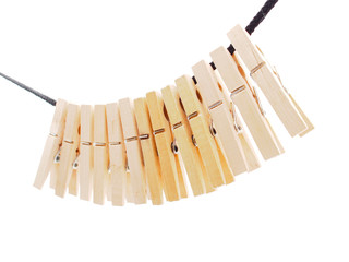 Clothespins and rope on a white background