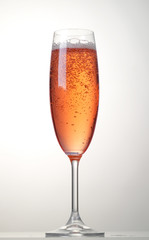 glass of pink sparkling wine