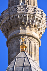 Turkish Mosque Minaret detail with traditional moon-star simbol