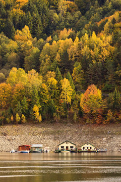Lake houses in a beautifull outum, Romania Bicaz Lake