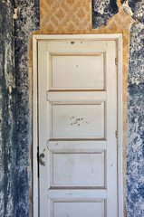 shut door in abandoned house