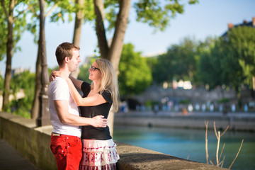 Dating couple in Paris on a summer day