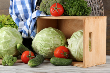 Composition of vegetables on table on wooden background