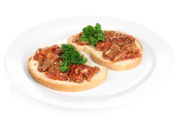 Tasty sandwiches with sardines  and tomato sauce, close-up