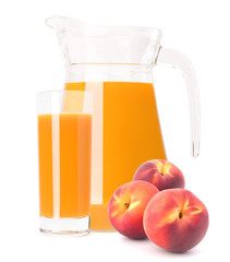 Peach fruit juice in glass jug