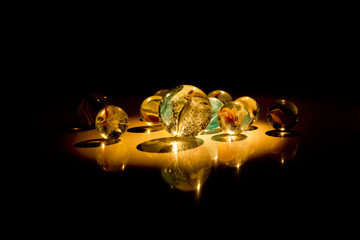 Group of marbles in the darkness