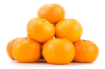 Heap of tangerines isolated on white background