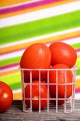 Red tomatoes in a container