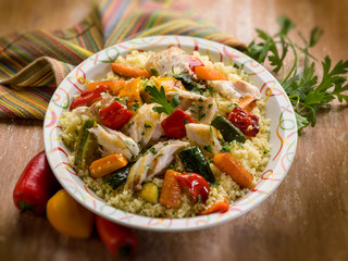 couscous with fish and vegetables, selective focus