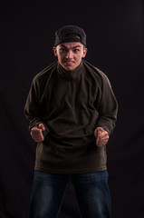 Obraz premium Goofy teenager wearing trendy cap, with a funny expression on hi